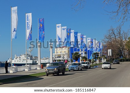 SOCHI, RUSSIA - MAR 22, 2014: The urban cityscape. Flags with the Olympic symbols in the street Nesebrskaya