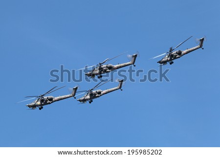 ZHUKOVSKY, RUSSIA-AUG 28, 2013: Group of the Mil Mi-28 (Havoc) is a Russian all-weather, military tandem, two-seat anti-armor attack helicopters at the International Aviation and Space salon MAKS-2013