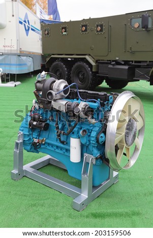 NIZHNY TAGIL, RUSSIA - SEP 25, 2013: The international exhibition of armament, military equipment and ammunition RUSSIA ARMS EXPO (RAE-2013). Diesel engine of high power