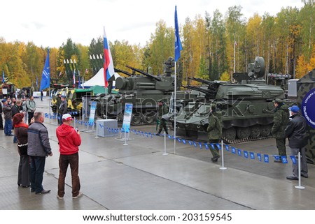 NIZHNY TAGIL, RUSSIA - SEP 24, 2013: The international exhibition of armament, military equipment and ammunition RUSSIA ARMS EXPO (RAE-2013). Air defense complexes 9K22 Tunguska and ZSU-23-4 Shilka