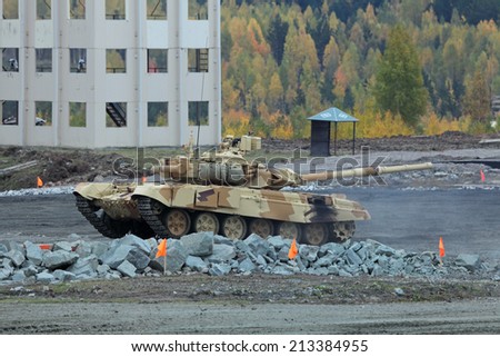 NIZHNY TAGIL, RUSSIA - SEP 25, 2013: The international exhibition of armament, military equipment and ammunition RUSSIA ARMS EXPO (RAE-2013). The T-72 is a Soviet second-generation main battle tank