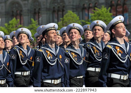MOSCOW, RUSSIA - MAY 09, 2014: Celebration of the 69th anniversary of the Victory Day (WWII). Solemn marching of soldiers in Red Square. The cadets of the St. Petersburg Sea Cadet Corps