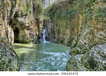 Waterfall on the river Agura in Agursky gorge on the territory of the Khosta district of Sochi in Krasnodar Krai of Russia