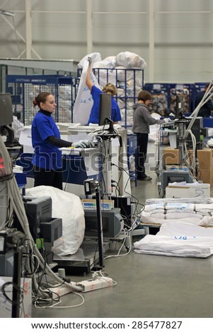 VNUKOVO, MOSCOW REGION, RUSSIA - APR 7, 2015: Russian Post. Logistics center in Vnukovo, employees in the workplace