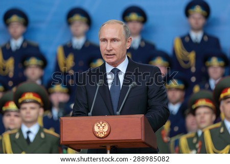KUBINKA, RUSSIA - JUN 16, 2015: The President of the Russian Federation Vladimir Putin at the opening ceremony of the International military-technical forum ARMY-2015 in military-Patriotic park