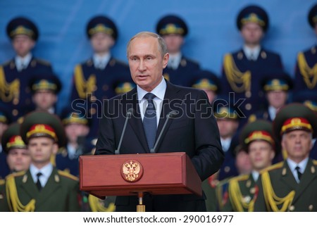 KUBINKA, RUSSIA - JUN 16, 2015: The President of the Russian Federation Vladimir Putin at the opening ceremony of the International military-technical forum ARMY-2015 in military-Patriotic park