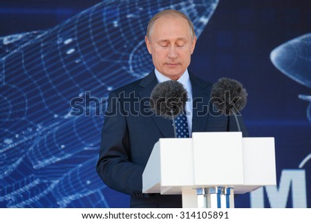 ZHUKOVSKY, MOSCOW REGION, RUSSIA - AUG 25, 2015: The President of the Russia Vladimir Putin with his eyes closed at the opening ceremony of the International Aviation and Space salon MAKS-2015