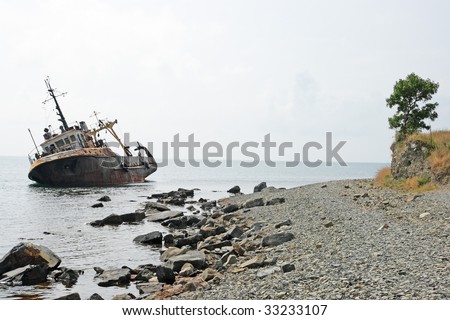 The thrown old ship has sat down on a bank