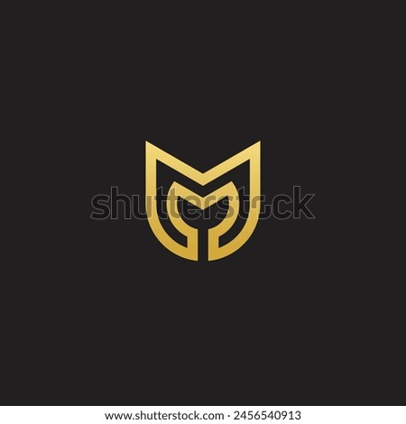 Creative M letter sheild flat monogram logo design with black background.Vector logo modern alphabet golden color font style.