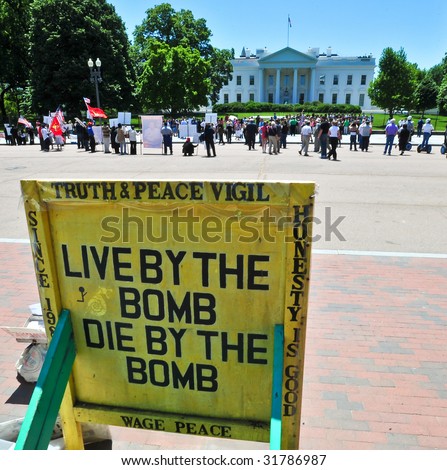 Anti-War sign outside the White House North Lawn in Washington, DC. GPS coordinates embedded in metadata.
