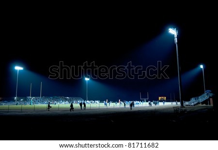 football competition at night in stadium