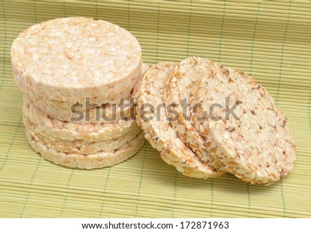 crackers on bamboo napkin. Includes rice, wholegrain, rye and rice cracker