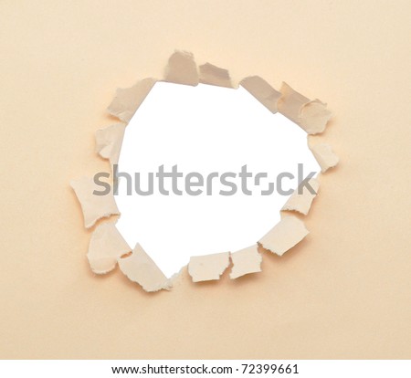 Torn paper - cardboard ripped apart showing underlying layer