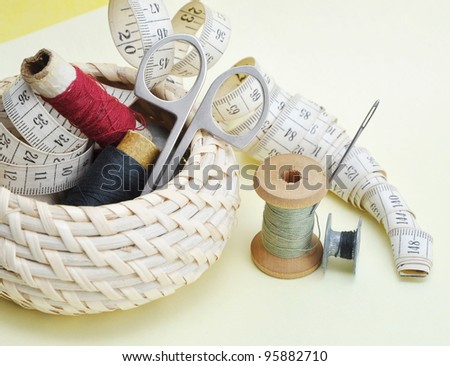 Still-life various accessories of sewing in a basket