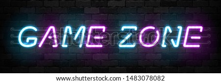 Vector realistic isolated neon sign of Game Zone typography logo for template and layout on the wall background. Concept of gaming.