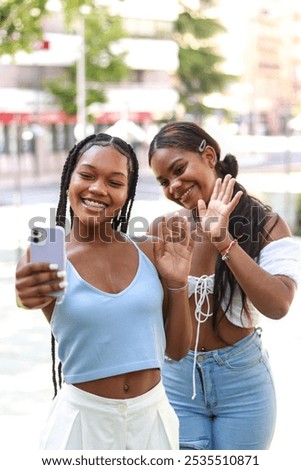 Similar – Image, Stock Photo Stylish black woman making a phone call on smartphone on the street