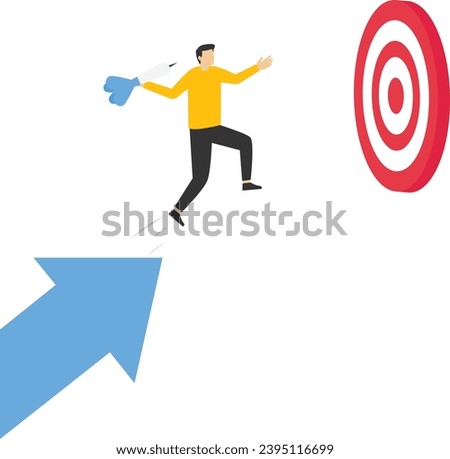 Successful business target achievement concept, achieve target and goal concept, hold graphic arrow up and jump on target bullseye to win in business strategy, businessman leader.

