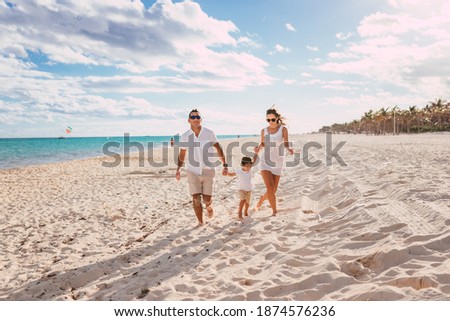 Similar – Boy walking in water of lake