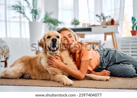 Similar – Image, Stock Photo A woman petting a street dog