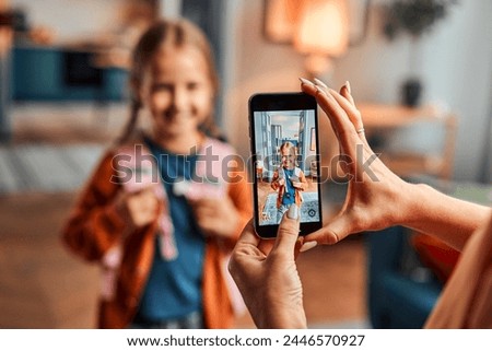 Similar – Image, Stock Photo A woman photographs a beautiful autumnal forest