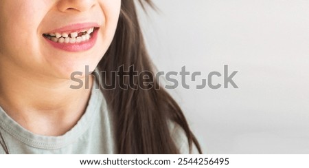 Similar – Image, Stock Photo Not visible at first sight, but the light makes the grimace visible