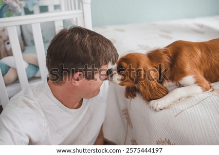 Similar – Image, Stock Photo Beautiful touching scene of mom and toddler son in blooming spring garden. Happy mother and baby boy embracing. Family, love, childhood concept.