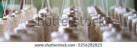 Similar – Image, Stock Photo Machine reeling thread on spool