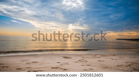 Similar – Image, Stock Photo sunset over the baltic sea, portrait of a young woman standing on the beach