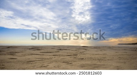 Similar – Image, Stock Photo sunset over the baltic sea, portrait of a young woman standing on the beach