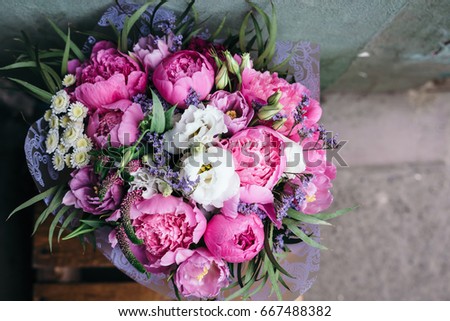Similar – Image, Stock Photo Close-up of a bouquet of tulips in a cloth bag on the shoulder of a girl. Gift for Women’s Day, Valentine’s Day, Mother’s Day
