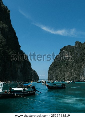 Similar – Image, Stock Photo Boat floating in calm sea water