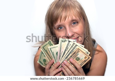young blond woman counts money dollars isolated