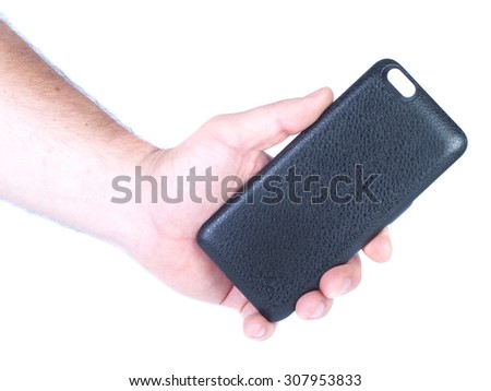 Man`s hand holds black iphone battery case isolated