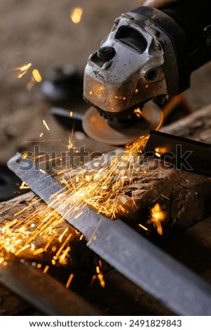 Similar – Image, Stock Photo Blacksmith cutting metal