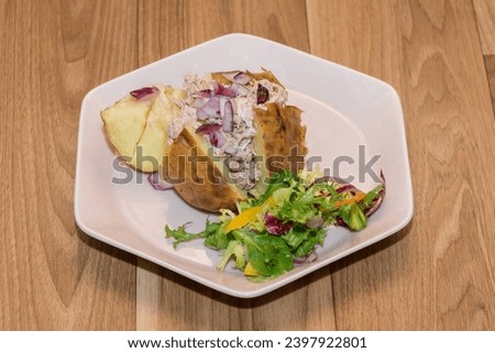 Similar – Image, Stock Photo Baking Potatoes And Leek Soup