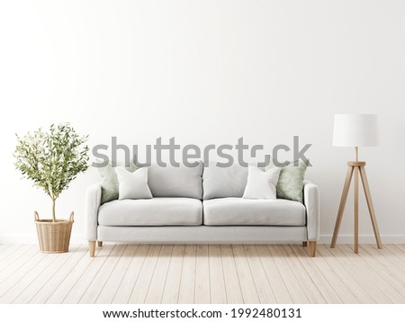 Traditional living room interior mockup with grey sofa and green pillows by olive tree in wicker basket and floor lamp on empty white wall background. 3d rendering, illustration