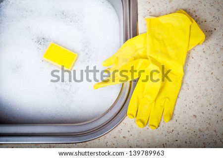 Photo of yellow rubber gloves