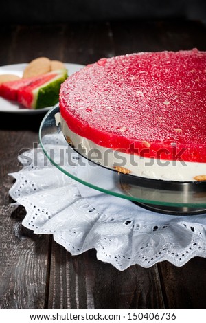 Cake made form watermelon jelly and mascarpone cheese with biscuits