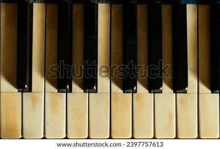 Image, Stock Photo abandoned old piano in a green field