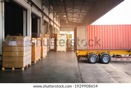 Shipping Cargo Container.Trailer Truck Parked Loading Package Boxes at Dock Warehouse. Cargo Shipment. Supply Chain. Industry Freight Truck Transportation. Shipping Warehousing Logistics. Photo stock © 