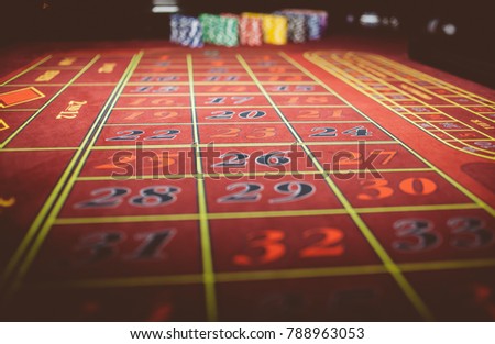 Casino Poker Chips Colorful Gaming Pieces Lie On The Game Table In Stack Casino Poker Chips Colorful Gaming Pieces Lie On The Game Table In Stack