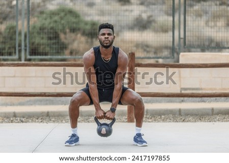 Similar – Image, Stock Photo Strong sportsman during intense training