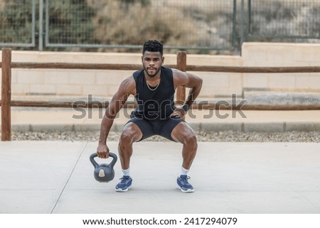 Similar – Image, Stock Photo Strong sportsman during intense training