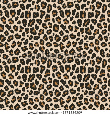 Leopard print. Vector seamless pattern. Animal skin background with black and brown spots on beige backdrop. Abstract exotic jungle texture. Repeat design for decor, fabric, textile, wallpapers, cloth Foto stock © 