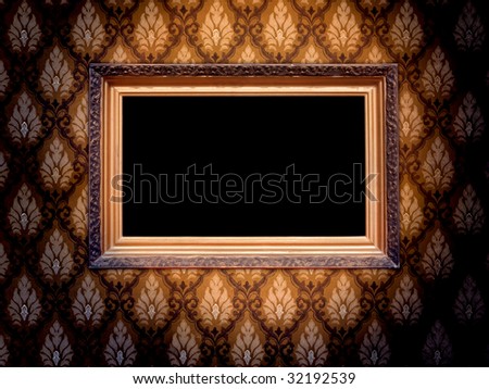 Blank Carved Gilded Frame Over Retro Wallpaper