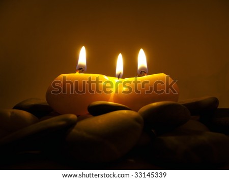 Romantic Candles on Sea Stones