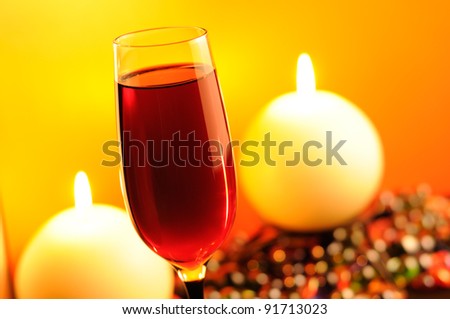 Romantic Evening - Glass of Red Wine and Burning Candles