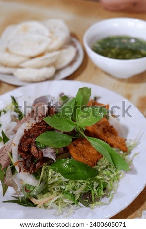 Similar – Image, Stock Photo Banh Uot Long Ga, unique vietnamese dry rice noodles (flat and wide like wet rice cake noodle) dish mixed with herbs and meat, a local delicacy of Da lat Vietnam