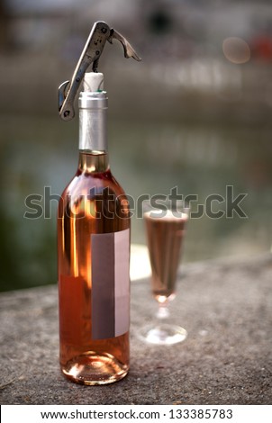 wine bottle, glass and opener