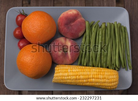 various foods in the kitchen Different ripe foods lying on a  table as a background